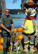 Pasco officer and K9 with  